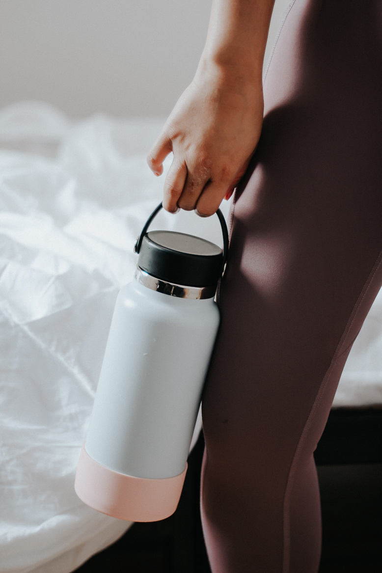Woman Holding Water Bottle